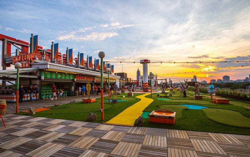 Take a trip to Skyline Park at Ponce City Market to catch sights of the city while playing a wide range of fun games. CONTRIBUTED BY JENNI GIRTMAN / ATLANTA EVENT PHOTOGRAPHY