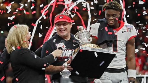 Georgia Bulldogs head coach Kirby Smart and Sugar Bowl MVP, wide receiver George Pickens (1), during the trophy presentation Wednesday, Jan. 1, 2020, at the Mercedes-Benz Superdome in New Orleans.  Georgia won 26 to 14.