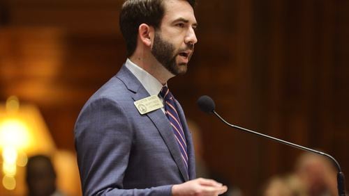 State Rep. Houston Gaines, R-Athens, speaks in support of Senate Bill 222 on Monday. The bill would prohibit county governments from accepting election donations from organizations. “We should not be seeing partisan outside interests funneling money into counties for one party or another,” Gaines said. “It’s common sense to make sure we’re banning outside money in our public elections.” (Natrice Miller/ Natrice.miller@ajc.com)