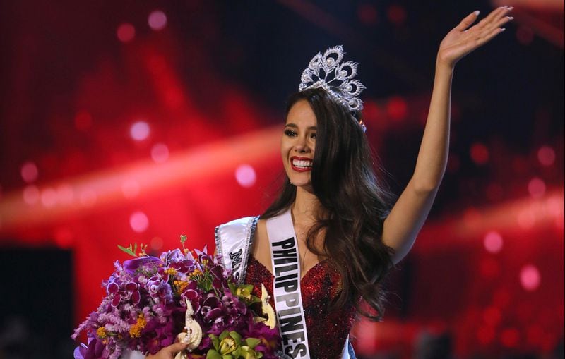 Catriona Gray of the Philippines waves to the audience after being crowned the new Miss Universe 2018 during the final round of the 67th Miss Universe competition in Bangkok, Thailand, Monday, Dec. 17, 2018.