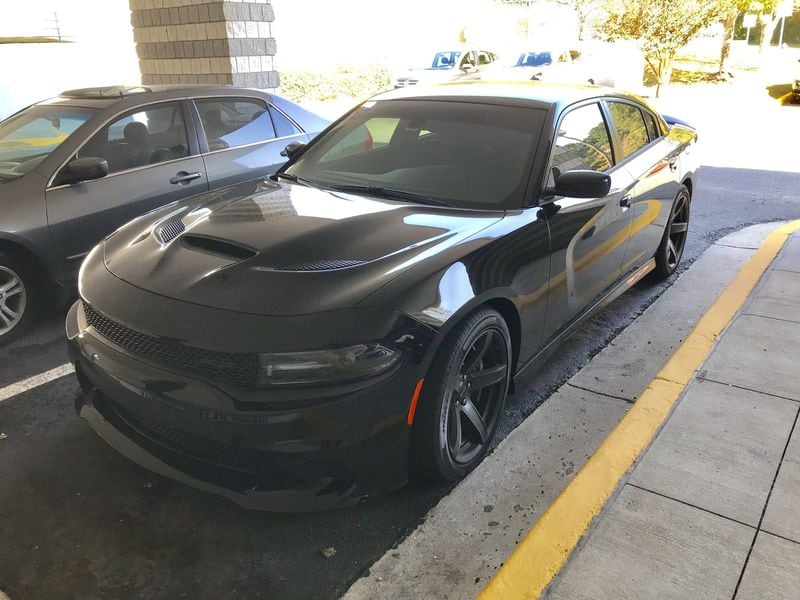 Gwinnett Sheriff Butch Conway’s space at the county jail shows the $69,000 Dodge Charger Hellcat that he continues to drive to this day. Reports earlier this year about the vehicle’s purchase with seized federal funds led to an audit by the Justice Department. TYLER ESTEP / TYLER.ESTEP@AJC.COM