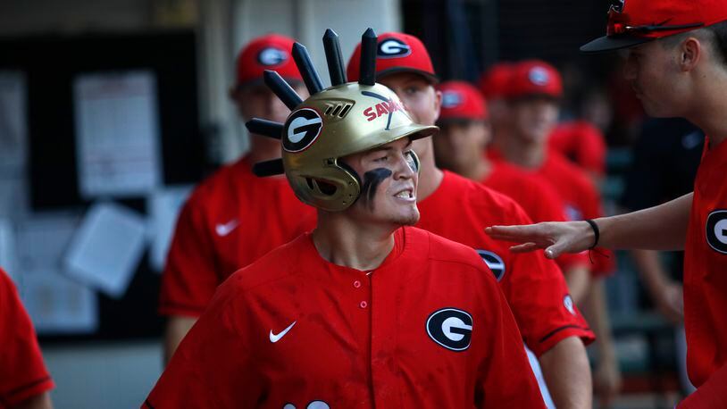 Georgia's Aaron Schunk (22) celebrates a home run against Mercer last season. An All-American pitcher and third baseman for the Bulldogs, Schunk was drafted in the second round in 2019 by the Colorado Rockies, who called him up to join their 60-man roster Sunday night. (Daniela Rico/ The Red & Black)