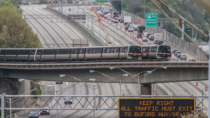 April 3, 2017 Atlanta:  Monday morning, April 3, 2017, as commuters adjusted their routes to compensate for the gaping hole in I-85, the sight of an empty I-85 just north of the collapse was also eerie. JOHN SPINK /JSPINK@AJC.COM