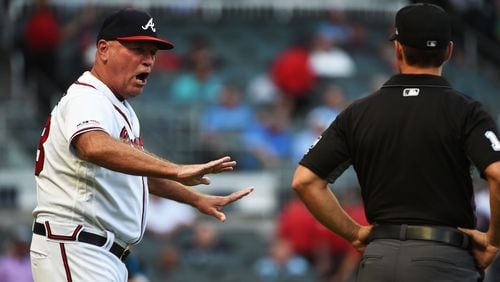 Braves manager Brian Snitker argues with the umpire Aug. 20, 2019, against the Miami Marlins at SunTrust Park in Atlanta. Snitker was tossed from the game.