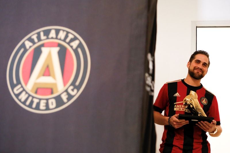 Photos from the press conference as Atlanta United forward Josef Martinez receives his Golden Boot trophy, given to the top MLS scorer each year, at the Atlanta United Training Facility in Marietta, Ga., on Thursday, Nov. 1, 2018. Atlanta Braves outfielder Ender Inciarte, a personal friend of Martinez, made a special guest appearance to give his friend the award. (Casey Sykes for The Atlanta Journal-Constitution)