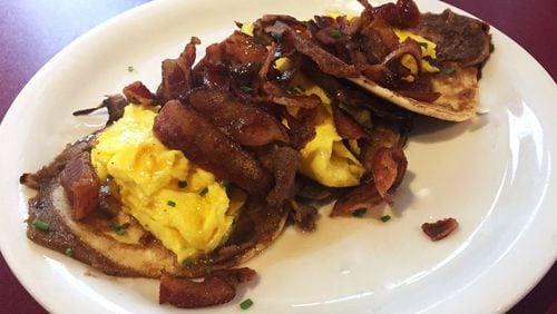 The breakfast tacos at Atlanta Breakfast Club are a delicious sweet-savory treat: Flour tortillas are cooked French toast style and loaded with smoky bacon and scrambled eggs and drizzled with syrup. CONTRIBUTED BY HENRI HOLLIS