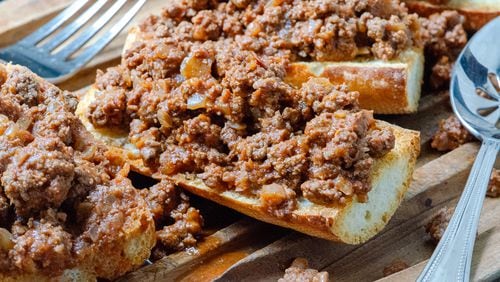 Beef Ragu Crostone on toasted baguette is an Italian-inspired simple supper. (Virginia Willis for The Atlanta Journal-Constitution)