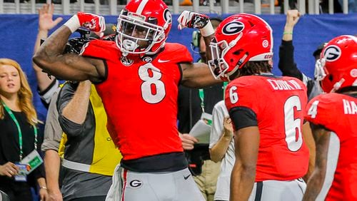 Georgia Bulldogs wide receiver Riley Ridley (8) celebrates after  a touchdown.