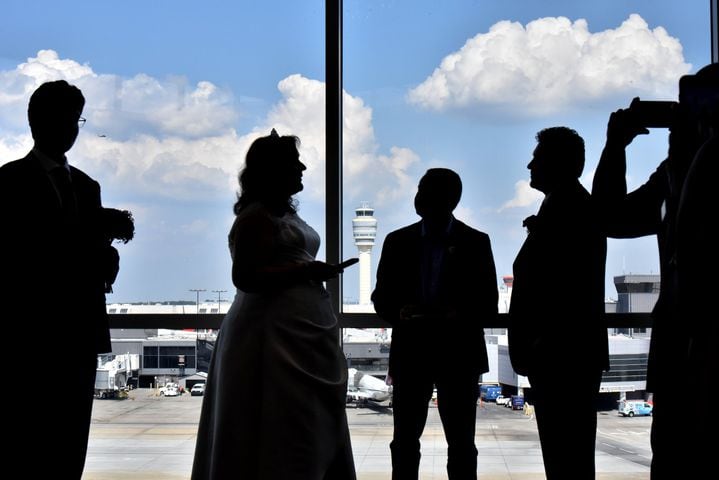 Airlines host weddings at airport, on flights, at Delta museum