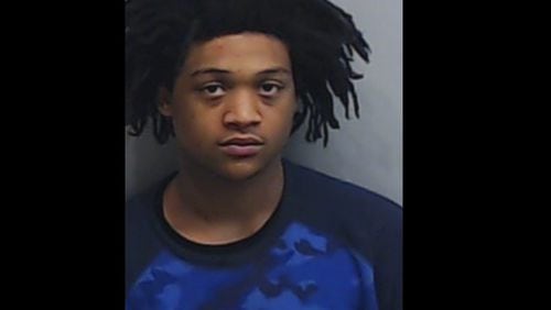 Deshaun Flournoy, 18, has turned himself in on charges of murder and criminal attempt to commit armed robbery.