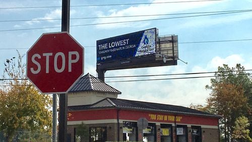 A reader wonders if Johns Creek billboards have “cellphone metadata collection technology installed on them.”