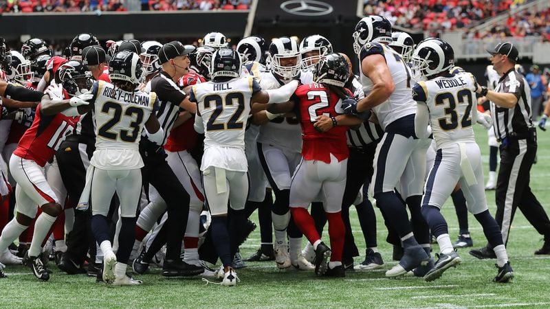 Things got heated in the third quarter as Falcons and Rams players engaged in a fight Sunday, Oct. 20, 2019, at Mercedes-Benz Stadium. Falcons running back Devonta Freeman (24) was  ejected for "throwing a punch."