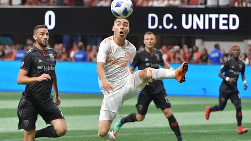 July 21, 2018  - Atlanta United midfielder Miguel Almiron (10) works the ball during the first half in a MLS soccer game at Mercedes-Benz Stadium on Saturday, July 21, 2018. HYOSUB SHIN / HSHIN@AJC.COM