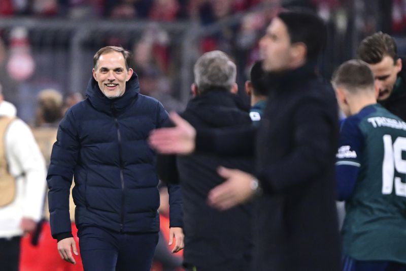 Bayern's head coach Thomas Tuchel, left, reacts during the Champions League quarter final second leg soccer match between Bayern Munich and Arsenal at the Allianz Arena in Munich, Germany, Wednesday, April 17, 2024. (AP Photo/Christian Bruna)