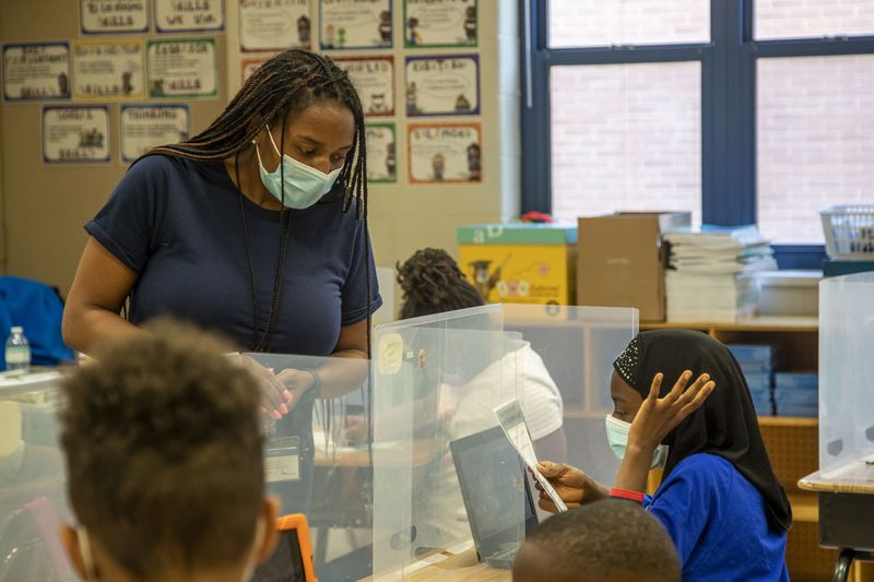 Second grade teacher Temica Cook interacts with her students during the Atlanta Public Schools' Summer Academic Recovery Academy at Cascade Elementary School in Atlanta on Wednesday, June 2, 2021.  (Alyssa Pointer / Alyssa.Pointer@ajc.com)