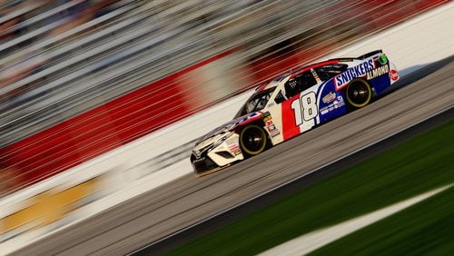 Folds of Honor QuikTrip 500 pole-sitter Kyle Busch takes his car its successful qualifying spin. (Jerry Markland/Getty Images)