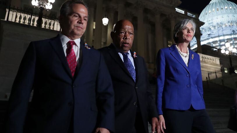 WASHINGTON, DC - JUNE 22: U.S. Rep. John Lewis (D-GA) (2nd L) walks down the steps of the Capitol after House Republicans have forced votes as House Democrats stages a sit-in on the House floor June 22, 2016 on Capitol Hill in Washington, DC. House Democrats are staging a sit-in on the House floor to demand Speaker Rep. Paul Ryan (R-WI) not to recess the House without voting on legislation including the bipartisan "No Fly, No Buy" legislation and a universal background check bill. (Photo by Alex Wong/Getty Images)