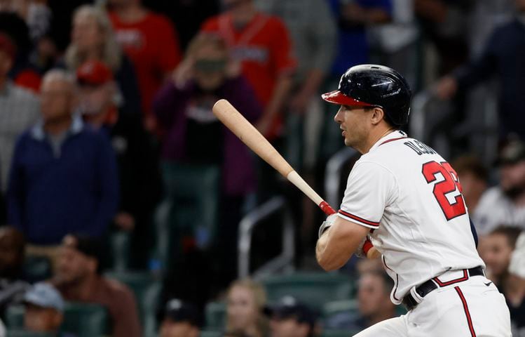 Atlanta Braves first baseman Matt Olson (28) hits an RBI single against the Philadelphia Phillies during the sixth inning of game two of the National League Division Series at Truist Park in Atlanta on Wednesday, October 12, 2022. (Jason Getz / Jason.Getz@ajc.com)