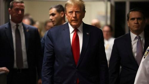 Former President Donald Trump outside the courtroom in State Supreme Court in Manhattan, on Feb. 15. On Monday Trump will go on trial in Manhattan as the first former U.S. president to be criminally prosecuted. The trial, which will begin with jury selection and last up to two months, will oscillate between salacious testimony about sex scandals and granular detail about corporate documents. (Jefferson Siegel/The New York Times)