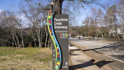 12/12/2019 — Brookhaven, Georgia — A decorative sign welcomes community members to the newly developed Peachtree Creek Greenway, Thursday, December 12, 2019. (ALYSSA POINTER/ALYSSA.POINTER@AJC.COM)