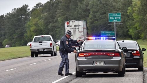Master trooper Bernie Talley makes a speeding stop on I-85 in LaGrange in April 2016. There are huge swatches of Georgia, almost all in rural Georgia, in which there are no troopers on the roads in the middle of the night. HYOSUB SHIN / HSHIN@AJC.COM