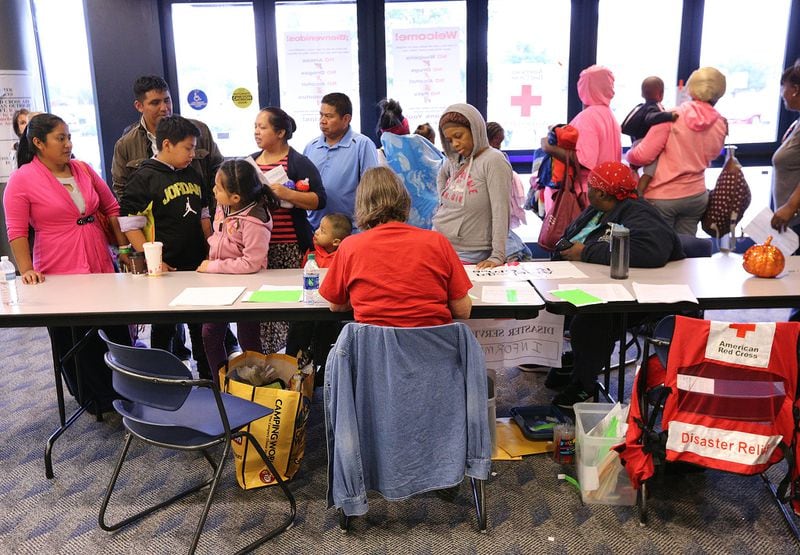 September 10, 2017 Albany: Local residents fill the lobby to check in to the Red Cross shelter at the Albany Civic Center to ride out Hurricane Irma on Sunday, September 10, 2017, in Albany.