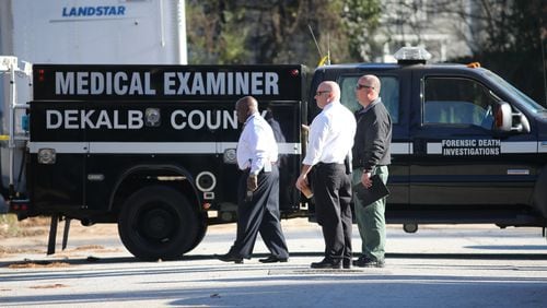 The DeKalb County Medical Examiner’s Office staff in a file photo. (BEN GRAY / BGRAY@AJC.COM)