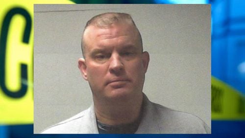 Matthew Moore, 48, of St. Clair County, Ala., is former officer for the Alabama Department of Corrections, Sandy Springs police said Tuesday in a statement.
