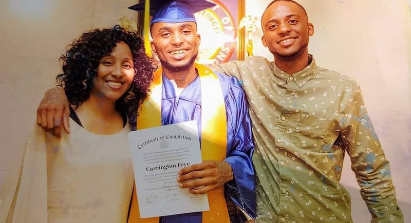 Carrington Frye (center) was killed in Macon State Prison in March 2020 during a fight over a contraband cellphone. (Family photo)