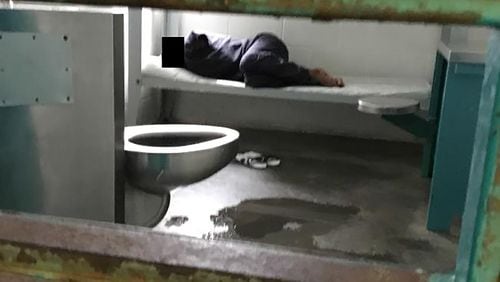 A woman lies on a thin mattress in her cell with water pooled at the foot of her metal bed, as seen during a midday visit at the South Fulton Municipal Regional Jail. This image is included in a federal lawsuit filed Wednesday, April 10, 2019, by the Georgia Advocacy Office and two women being held at the jail. The lawsuit includes graphic photos from a recent visit to the jail — among them this one — and details unimaginable conditions for the women detainees.