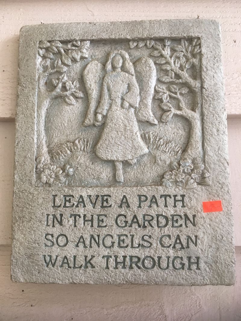 This plaque hangs outside the back door. Photo: Jennifer Brett