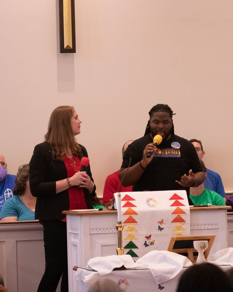 Co-Pastor Andi Woodworth and Kylan C. Pew, director of restorative practices at Neighborhood Church, addressed about 100 people at Oconee Street United Methodist Church.