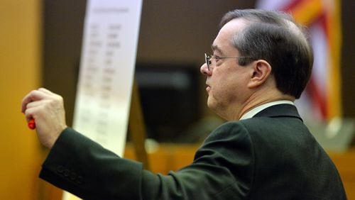 John Floyd in Fulton County Superior Court on March 16, 2015, when he played a pivotal role in the state's closing arguments in the Atlanta Public Schools test-cheating trial. Floyd served as the state's premier expert on the RICO statute. (Kent D. Johnson / AJC file photo)