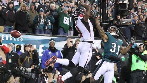 Julio Jones can’t make the catch on a fourth down attempt from Matt Ryan with Jalen Mills defending in the end zone in the final minute of the game to fall 15-10 to the Eagles in their NFC Divisional Game on Saturday, January 13, 2018, in Philadelphia.    Curtis Compton/ccompton@ajc.com