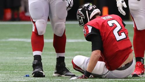 Falcons quarterback Matt Ryan sits on the turf after Los Angeles Rams defensive tackle Aaron Donald leveled him causing a fumble Sunday, Oct. 20, 2019, in Atlanta. Ryan left the game with an ankle injury and did not return.