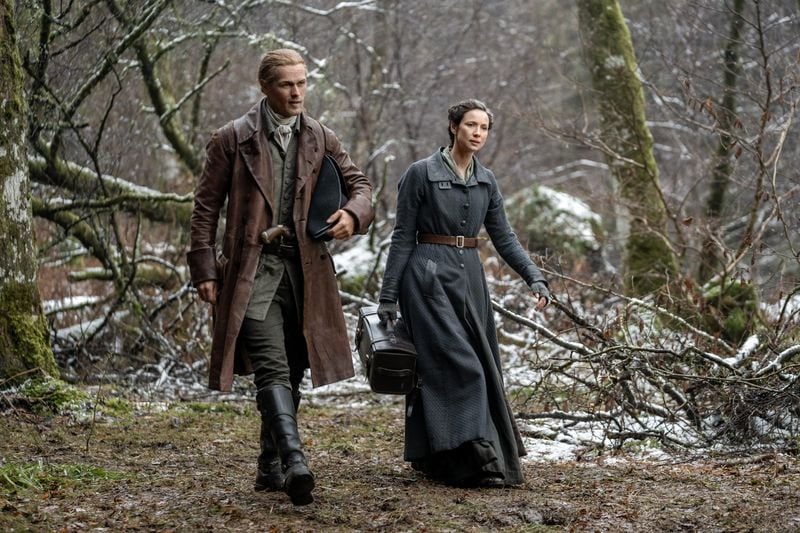 Sam Heughan as Jamie Fraser and Caitriona Balfe as Claire Fraser appear in a scene from “Outlander,” which runs on Starz. Courtesy of Robert Wilson/Starz Entertainment/TNS