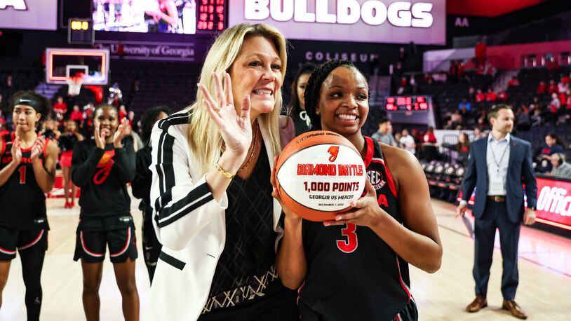 Georgia coach Katie Abrahamson-Henderson and guard Diamond Battles will make their second trip in two seasons to Carver-Hawkeye Arena in Iowa City, Iowa, when the Bulldogs meet Florida State in the NCAA Tournament on Friday. Georgia's coach starred for the Hawkeyes in the 1980s after playing two seasons at UGA. (Photo by Kayla Renie)