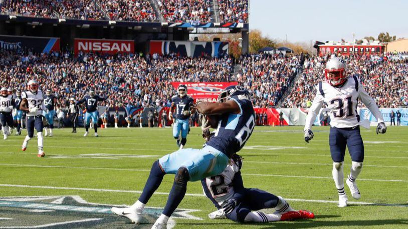 Jonnu Smith caught a  touchdown pass for the Tennessee Titans on Sunday. A fan trying to catch a free T-shirt was critically injured when he fells from the stands.