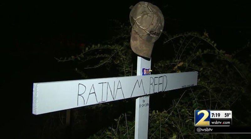 A memorial to Raina Reed sits near where she was killed in a car crash Thursday night. (Credit: Channel 2 Action News)