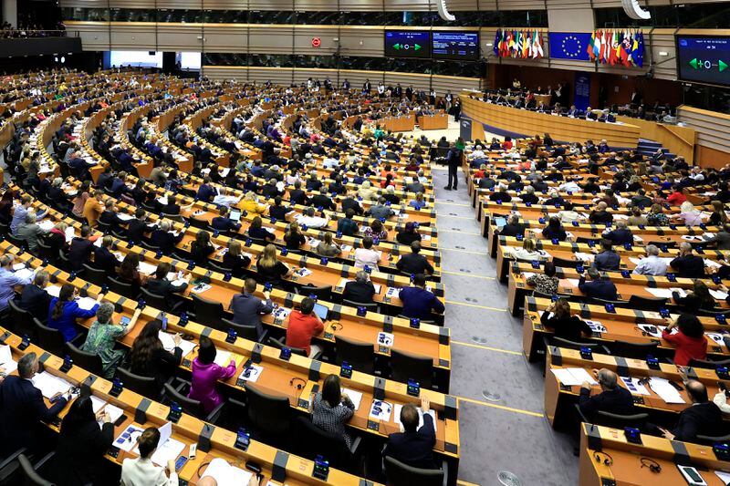 FILE - Members of European Parliament participate in a series of votes as they attend a plenary session at the European Parliament in Brussels, on April 10, 2024. The European Union marks Europe Day on Thursday, May 9, but instead of the traditionally muted celebrations, all eyes are on the EU elections in one month time which portend a steep rise of the extreme right and a possible move away from its global trendsetting climate policies. (AP Photo/Geert Vanden Wijngaert, File)