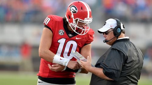 Quarterback Jacob Eason and offensive coordinator Jim Chaney  are in their first year at Georgia.
