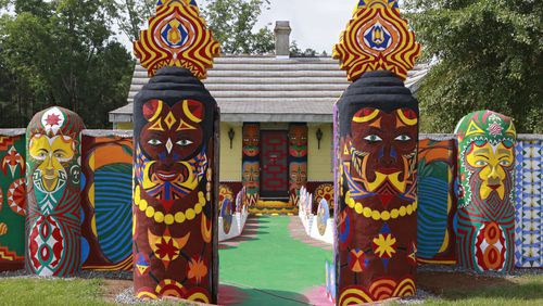 The vibrantly restored entrance to Pasaquan, with painted totems that appear throughout the site. Pasaquan is an art installation created by the late visionary artist Eddie Owens Martin in Buena Vista, Ga. Bob Andres / bandres@ajc.com