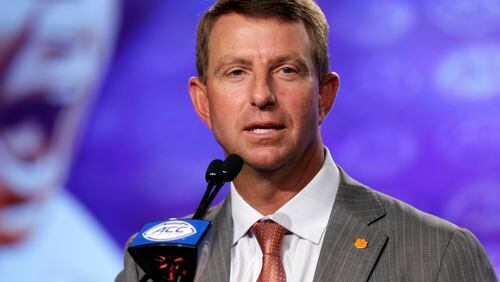 Clemson coach Dabo Swinney fills in the media on the Tigers situation during last week’s ACC Football Kickoff. (AP Photo/Chuck Burton)