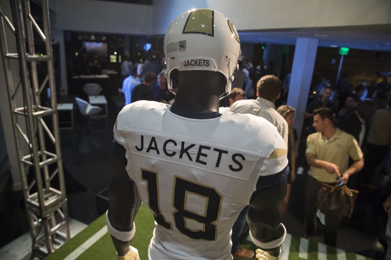 The new Georgia Tech football uniforms are displayed at Ventanas during a uniform reveal party in Atlanta, Friday, August 3, 2018. The university collaborated with Adidas to create new uniforms for the 2018 season.  (ALYSSA POINTER/ALYSSA.POINTER@AJC.COM)