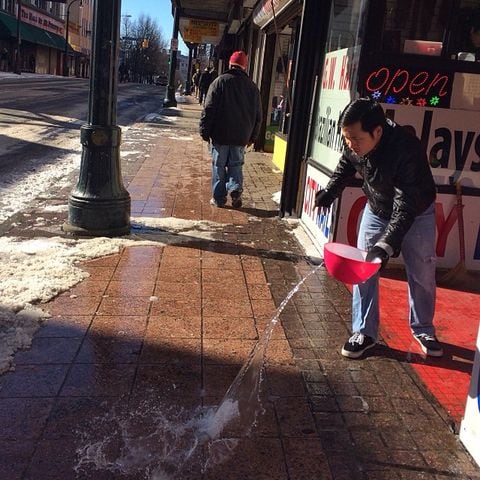 A little warm water to help melt the ice on #Peachtree Street in downtown #Atlanta. #runography #snowjam2014 #atlweather -- @ajcbgray