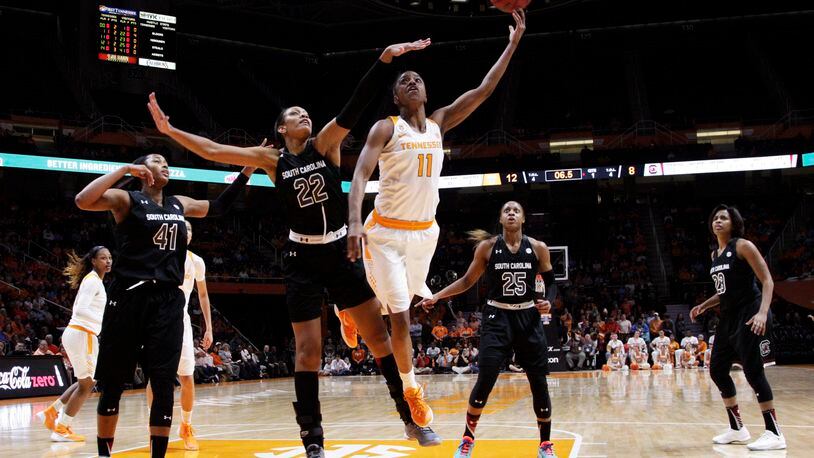 Tennessee guard Diamond DeShields (11) puts up a shot as she's defended by South Carolina forward A'ja Wilson (22) in the first half of an NCAA college basketball game Monday, Feb. 15, 2016, in Knoxville, Tenn. (AP Photo/Wade Payne)