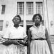 Students Martha Ann Holmes and Rosalyn Walton arrive at Murphy High School on Aug. 30, 1961. Holmes went on to graduate from Spelman and became an APS elementary school teacher. Walton became a system manager for the Internal Revenue Service. Walton (now Rosalyn Walton-Lees) was one of three Atlanta Nine students honored by the APS in a 2011 ceremony. (Bill Wilson / AJC Archive at the GSU Library AJCP297-004g)
