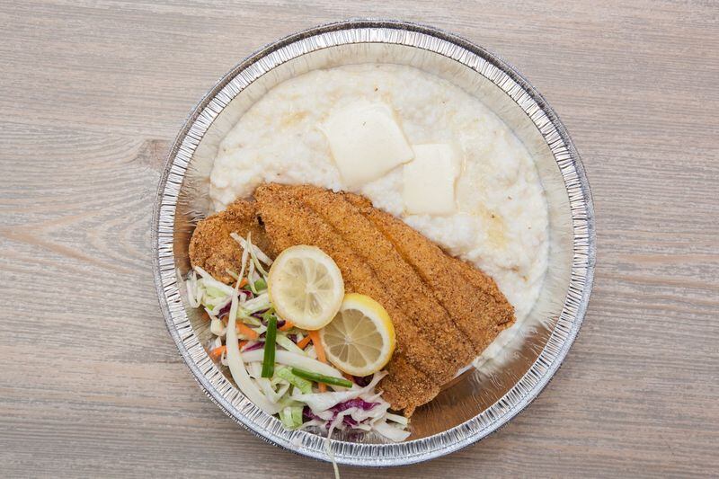 One really good dish at Annie Mae’s Pantry is the fried catfish with creamy grits, shown here with apple-jalapeño coleslaw. CONTRIBUTED BY ANNIE MAE’S PANTRY