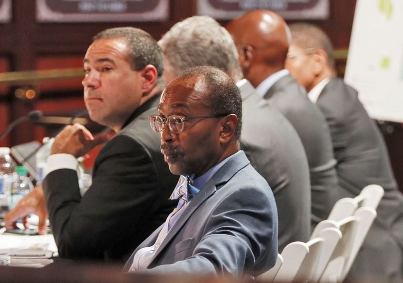 Alvin Kendall (center, front), outside lawyer for the city in the deal, and Peter Andrews (left), a lawyer with Greenberg Traurig, presented aspects of the Gulch deal Thursday to members of Atlanta City Council. Mayor Keisha Lance Bottoms faces the biggest test yet of her tenure as mayor with a pending vote to approve a massive public subsidy to redevelop downtown’s Gulch. BOB ANDRES /BANDRES@AJC.COM