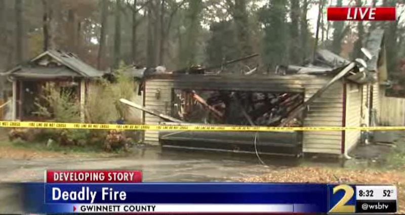 A man was killed and two people were injured in a house fire in Gwinnett County.